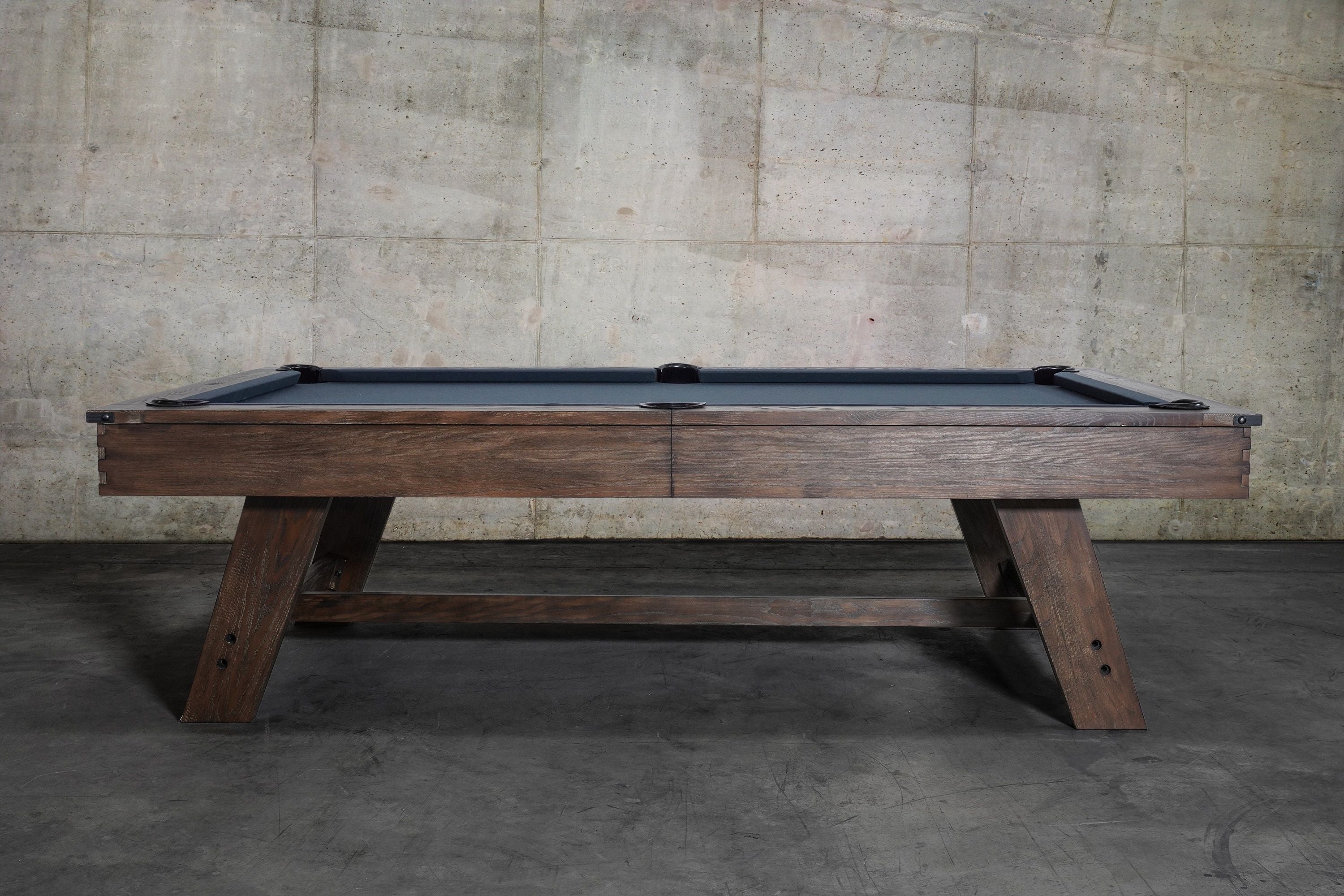Nixon Billiards Hunter Slate Pool Table Brushed Walnut Wood Leg Side Angle Lifestyle