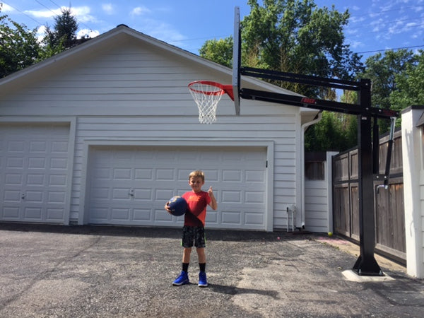 First Team Force In Ground Adjustable Basketball Goal Series Garage